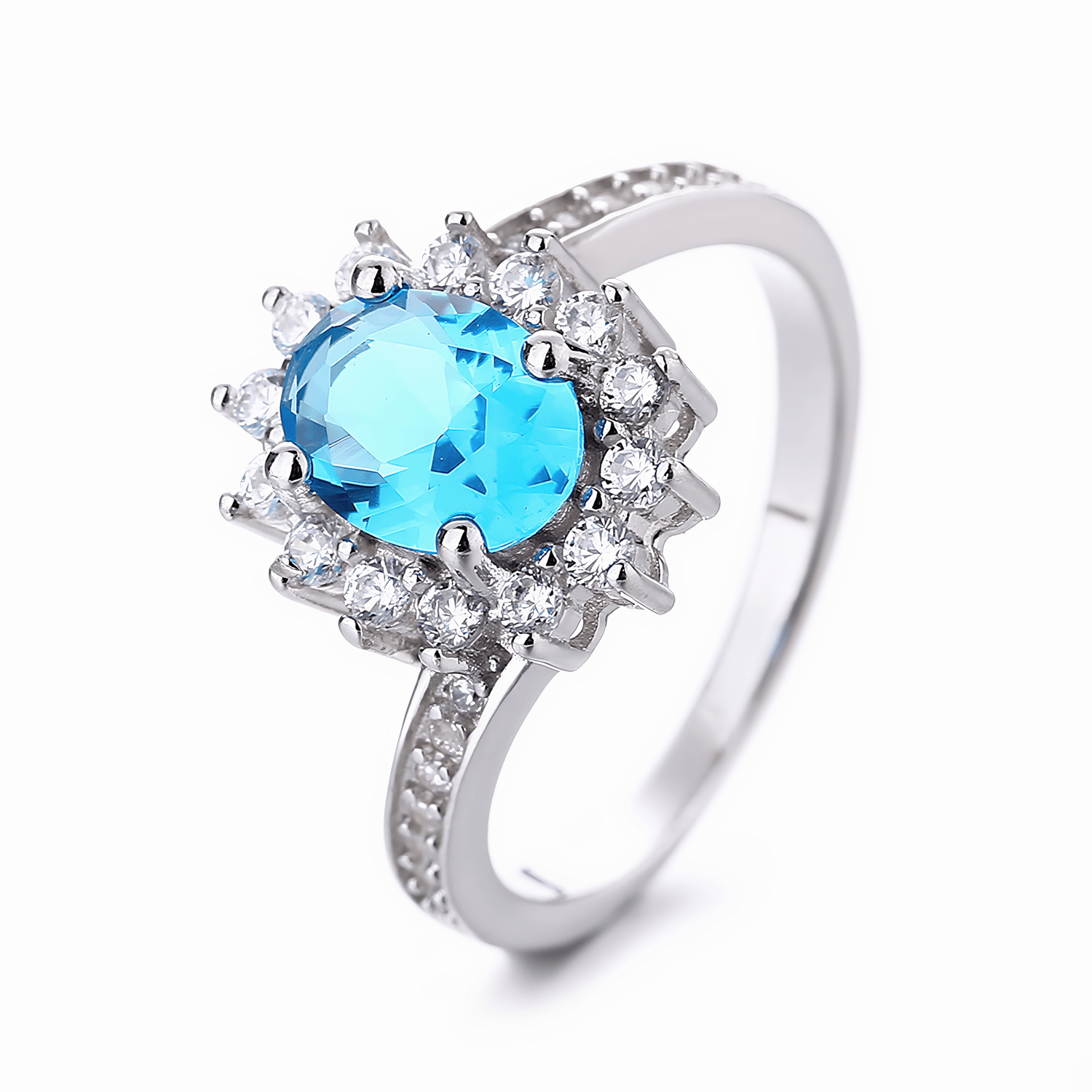 Ocean Bloom – Sterling Silver Ring with Oval Blue CZ and Halo of White Accents - NAFALUXE
