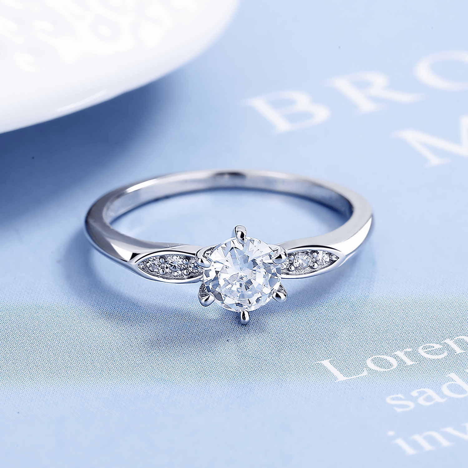 Timeless Spark – Sterling Silver Ring with Round Brilliant Center and Marquise Accents - NAFALUXE