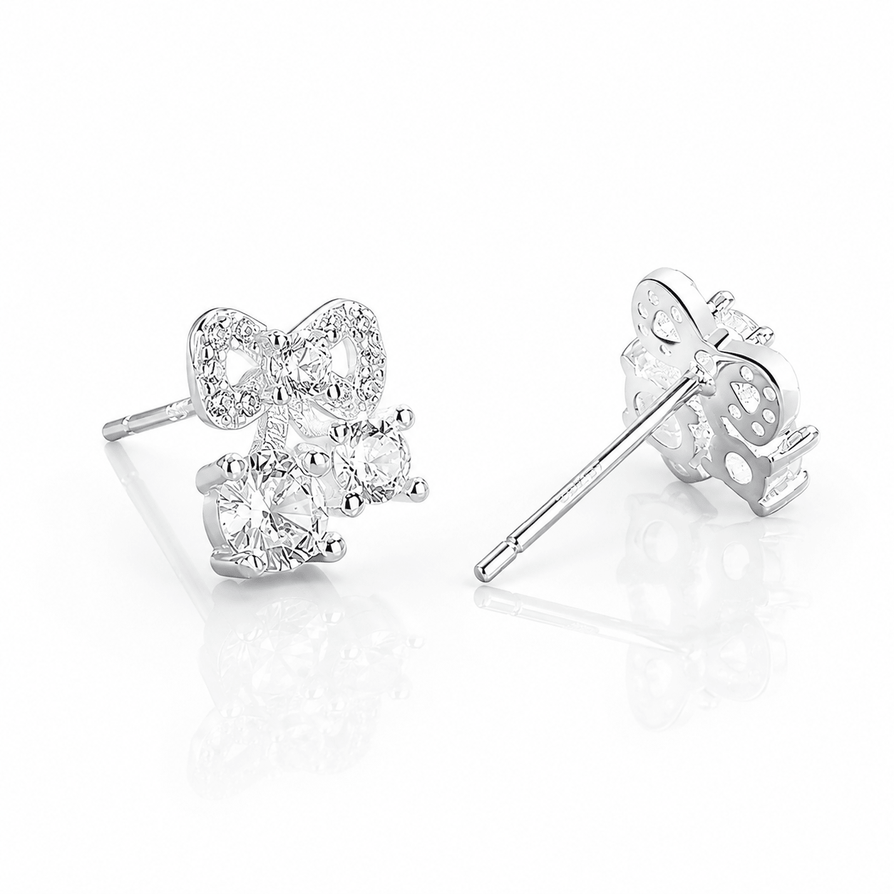 Boucles d'oreilles à clip en forme d'arc avec trio de zircons cubiques AAA - NAFALUXE
