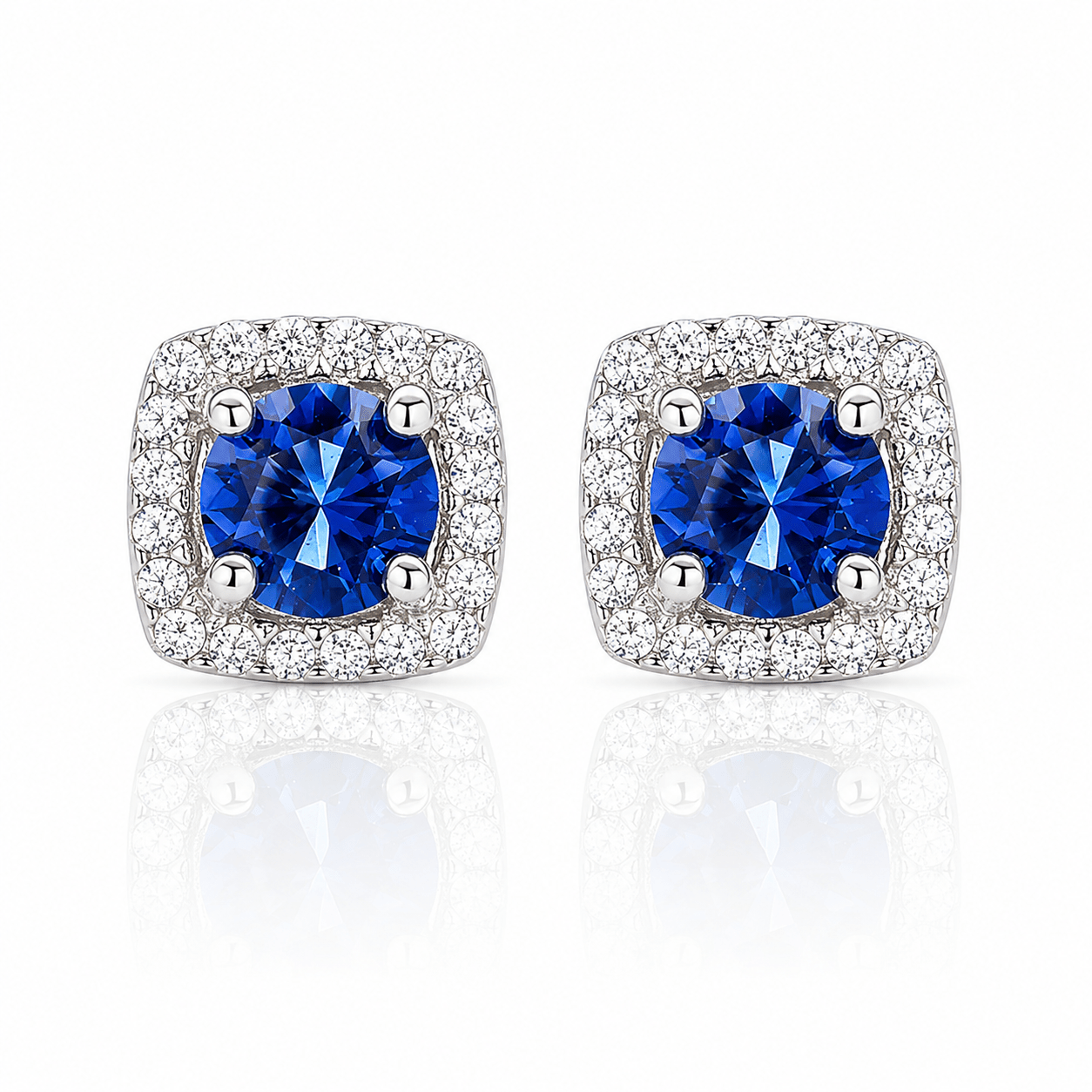 Boucles d'oreilles clous « coussin » avec pierre centrale bleue et halo de zircone cubique AAA - NAFALUXE