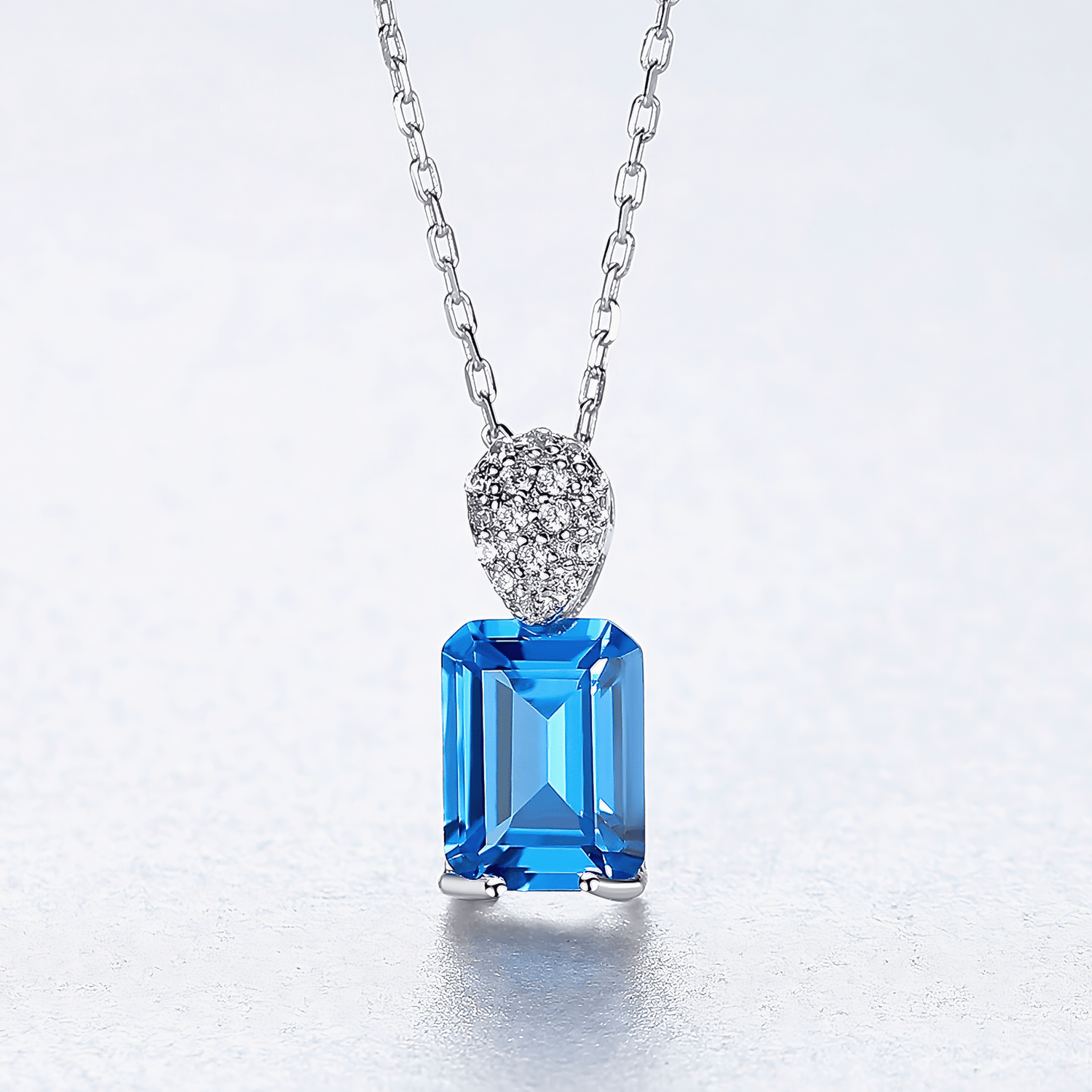 Elegant Blue Emerald - Cut CZ Sterling Silver Pendant Necklace - NAFALUXE