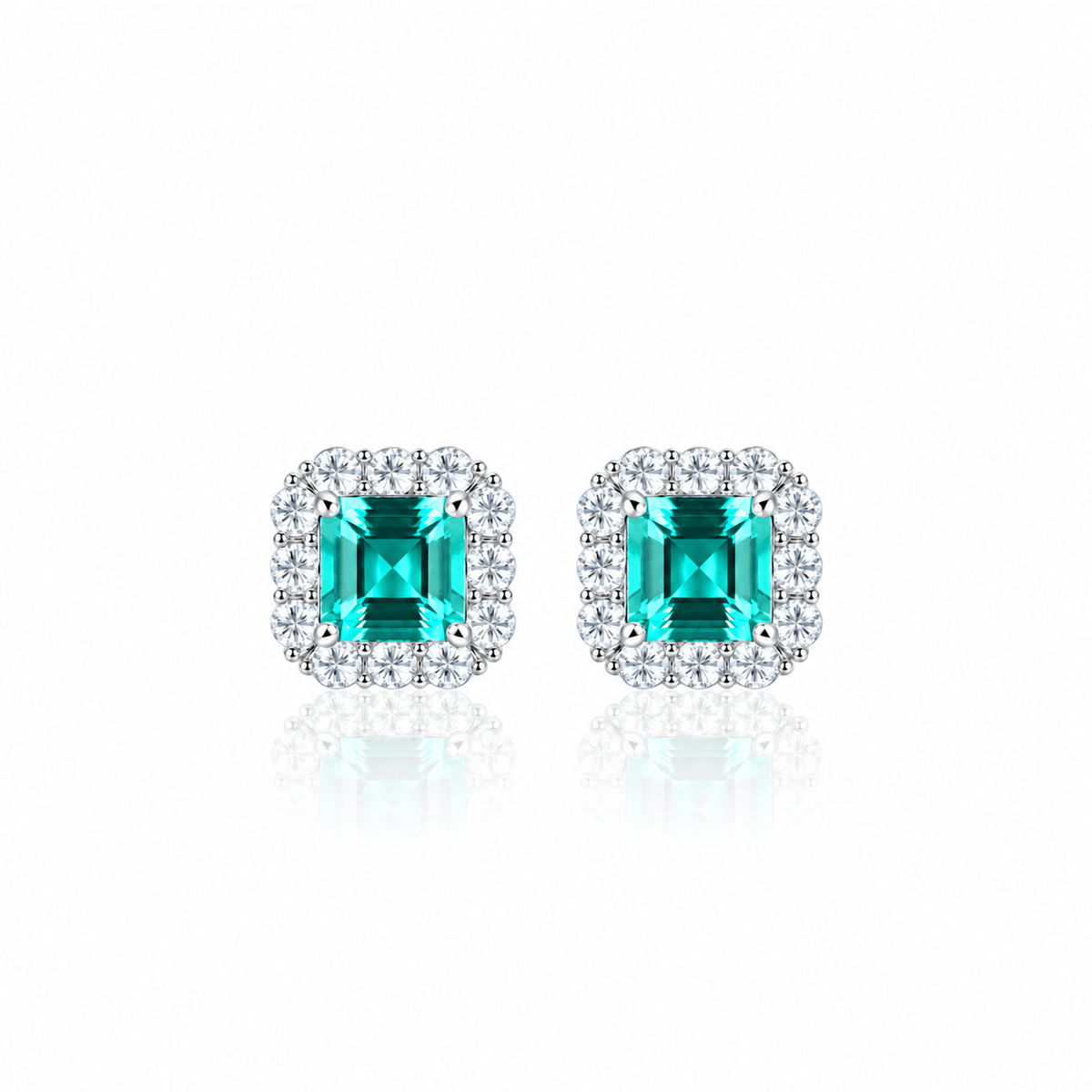 Elegant Emerald-Cut Aqua Blue CZ Halo Stud Earrings in Sterling Silver - NAFALUXE