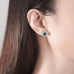 Elegant Emerald - Cut Aqua Blue CZ Halo Stud Earrings in Sterling Silver - NAFALUXE
