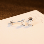 Elegant Emerald - Cut CZ Sterling Silver Stud Earrings - NAFALUXE