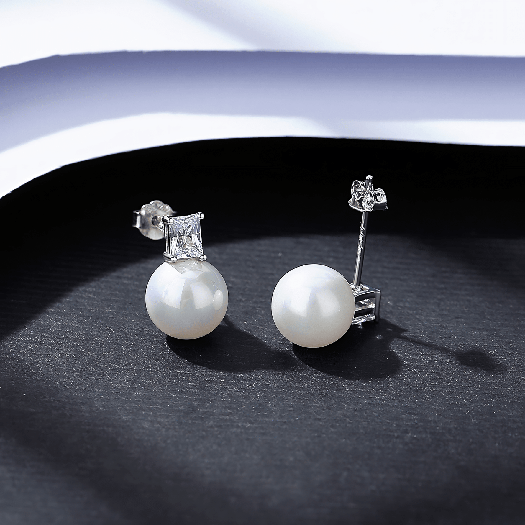 Elegant Pearl & Emerald - Cut CZ Stud Earrings in Sterling Silver - NAFALUXE