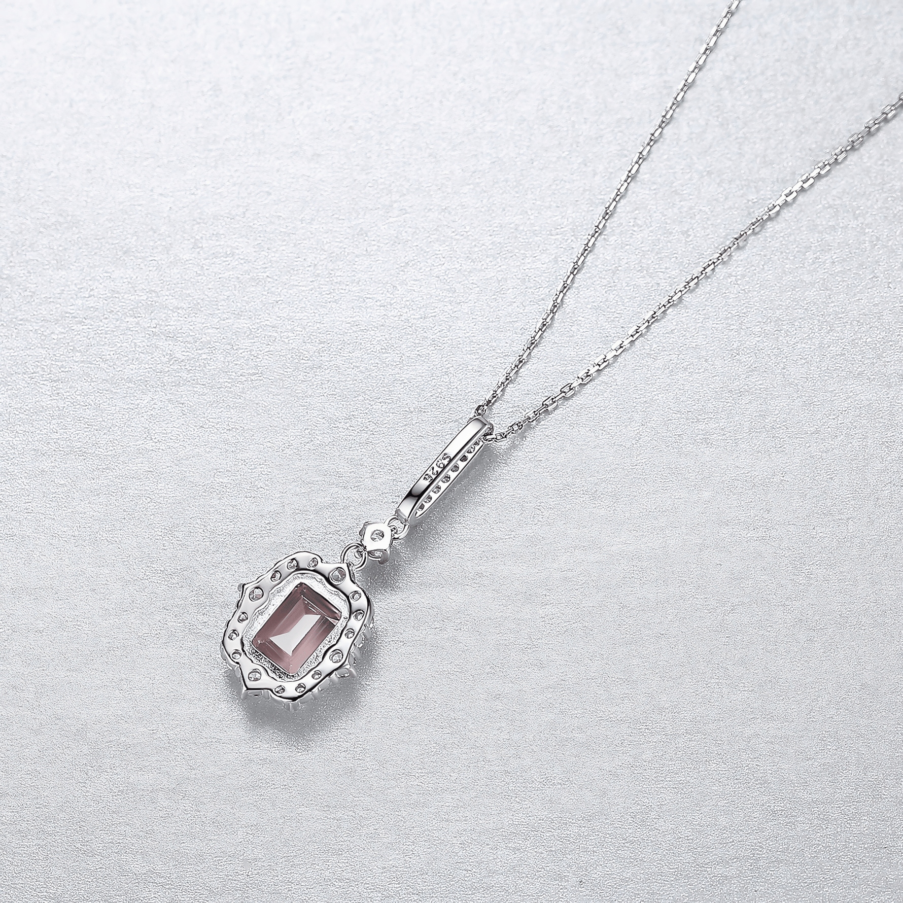 Elegant Pink Emerald - Cut CZ Halo Pendant Necklace in Sterling Silver - NAFALUXE