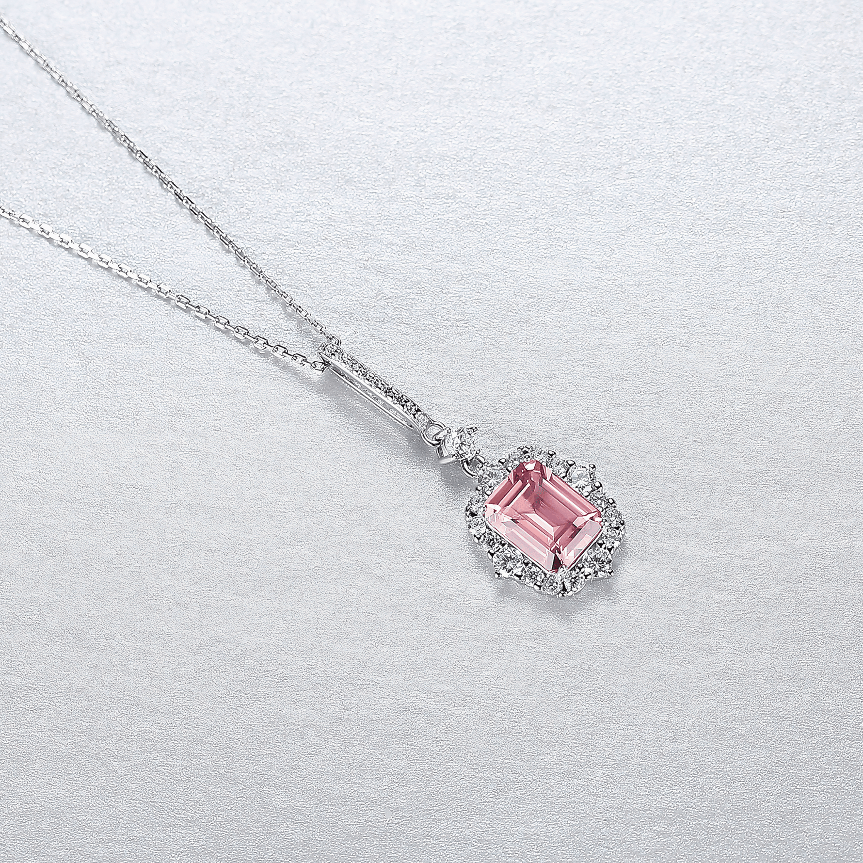 Elegant Pink Emerald - Cut CZ Halo Pendant Necklace in Sterling Silver - NAFALUXE