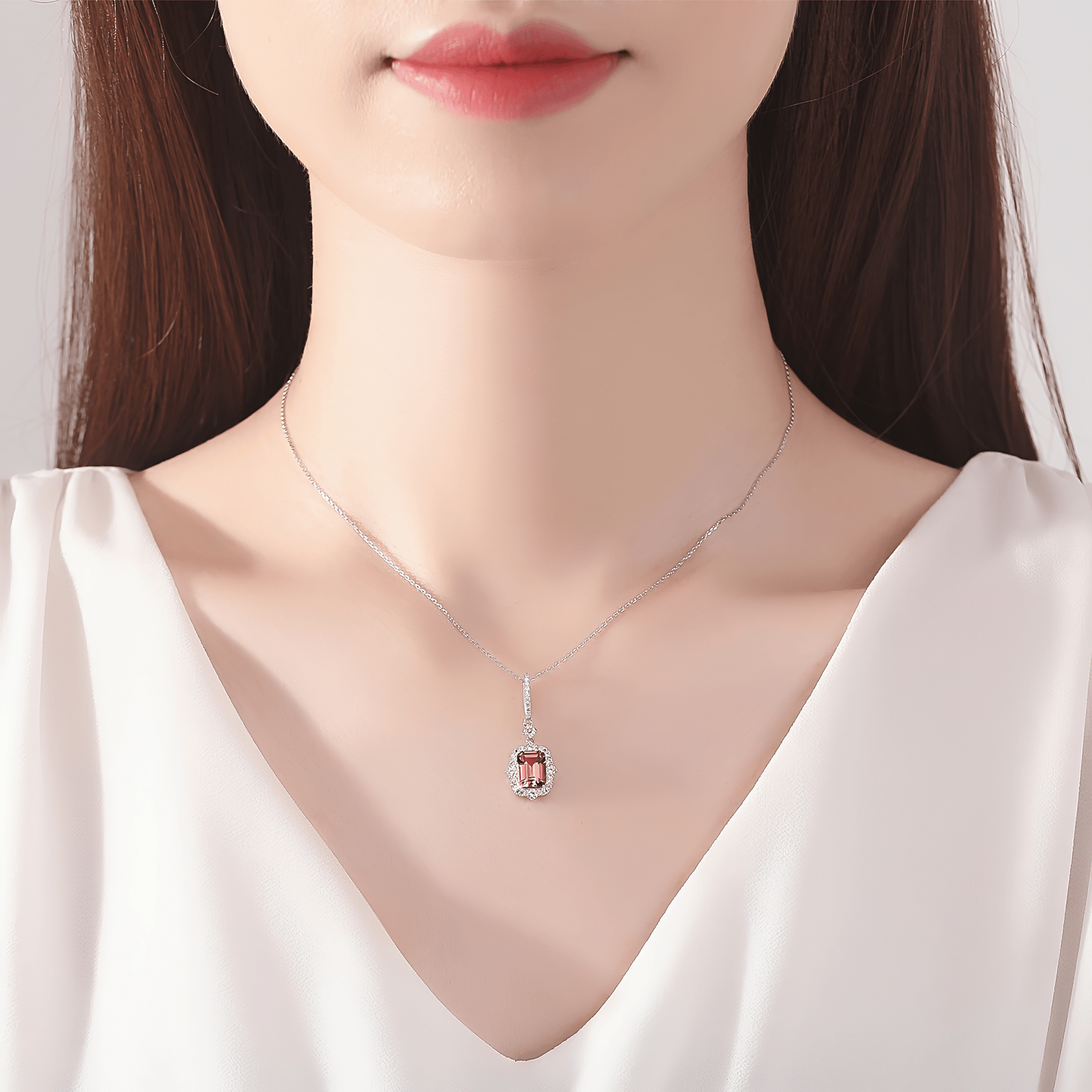 Elegant Pink Emerald - Cut CZ Halo Pendant Necklace in Sterling Silver - NAFALUXE
