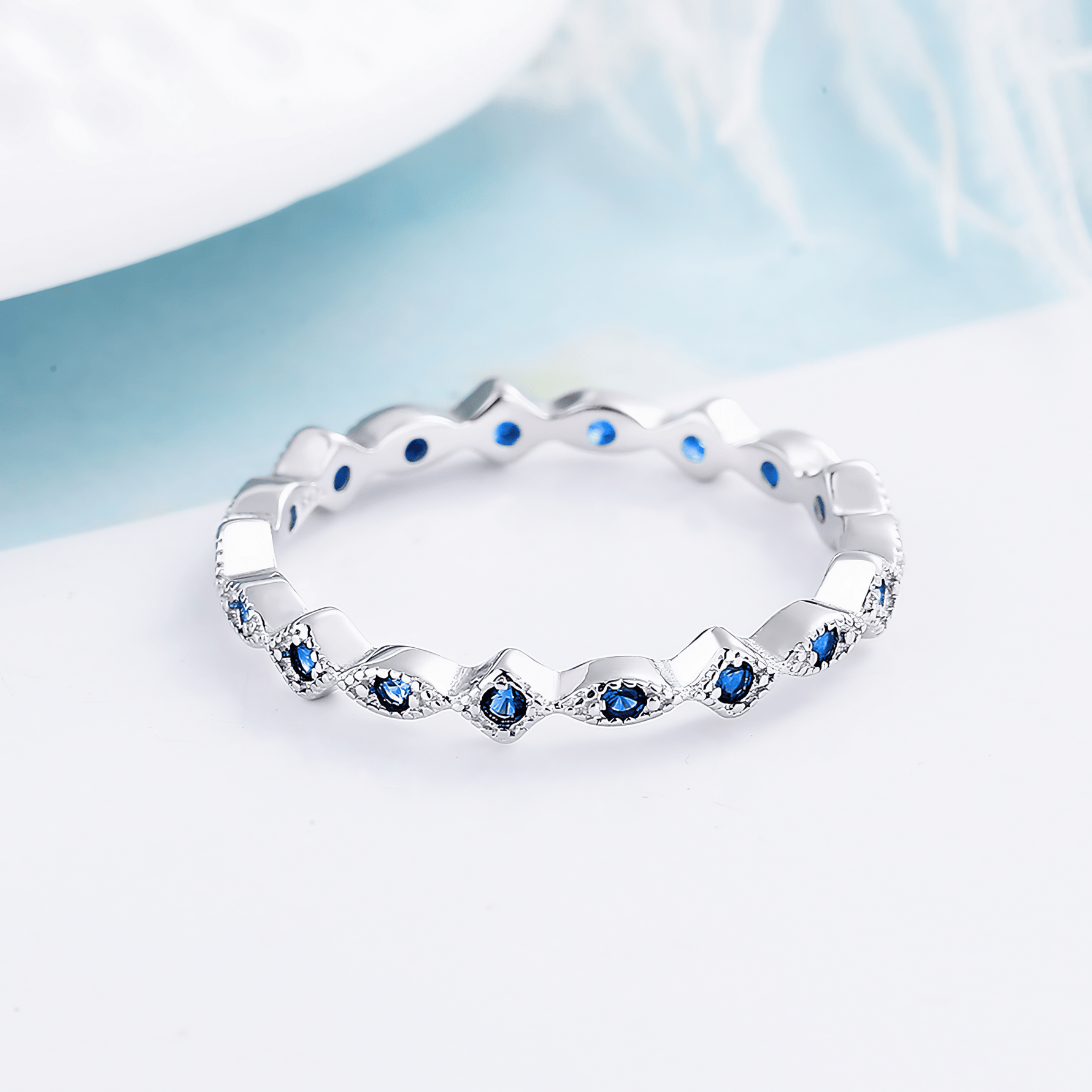 Emerald Vine – Sterling Silver Eternity Band with Marquise Green CZ Accents - NAFALUXE