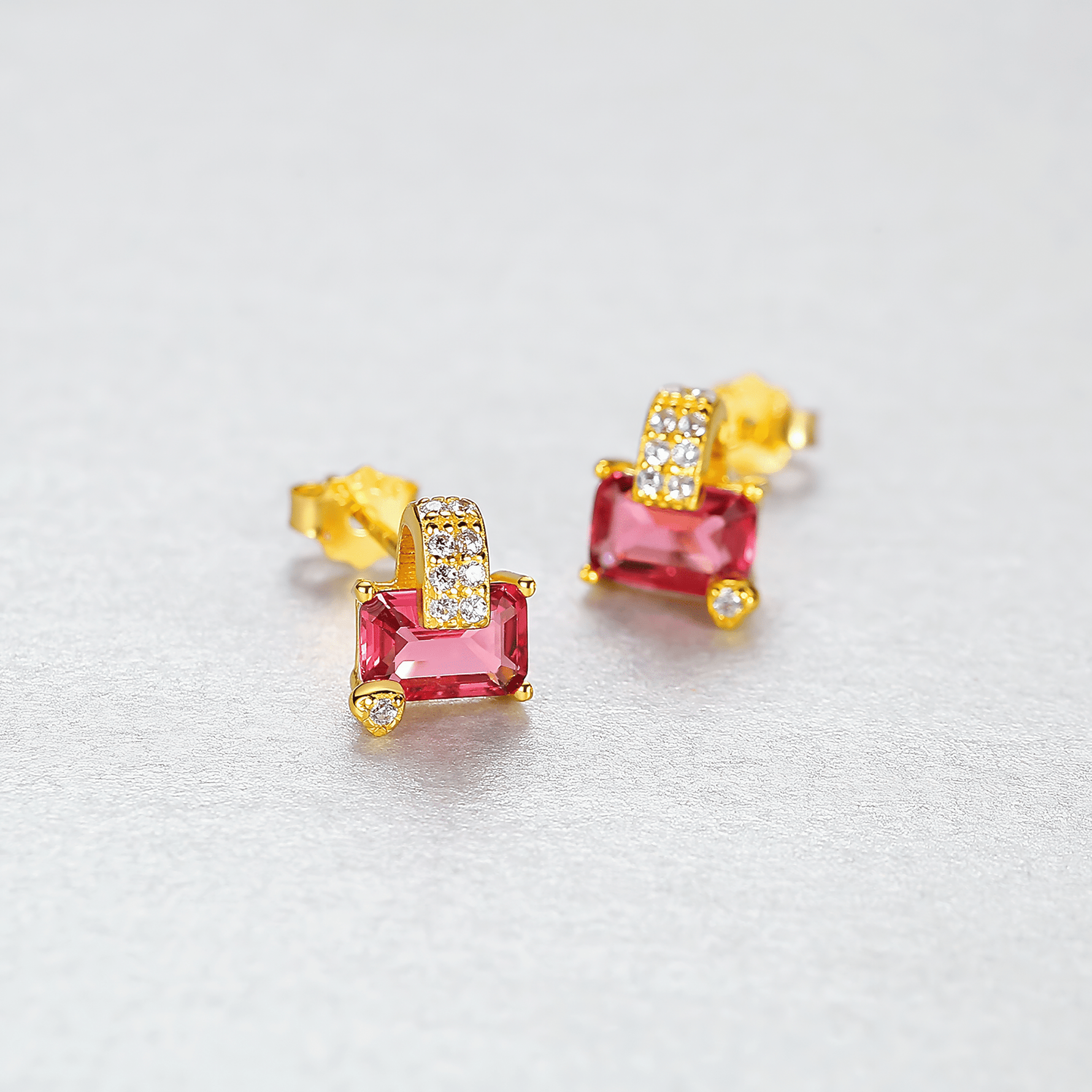 Gold - Plated Pink Emerald - Cut CZ Stud Earrings in Sterling Silver - NAFALUXE