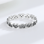 Heartbeat Spark – Sterling Silver Eternity Band with Blackened Heart Accents & CZ Stones - NAFALUXE