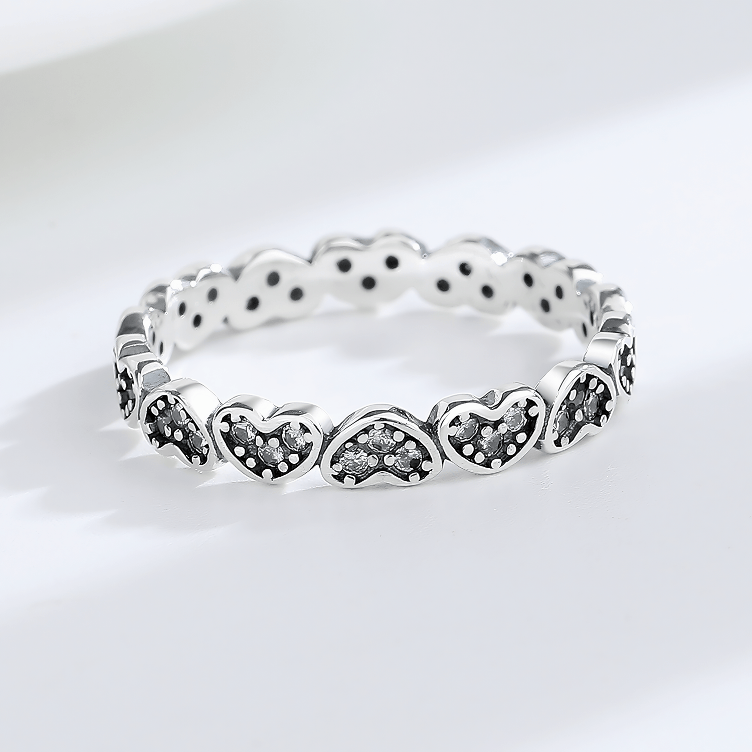 Heartbeat Spark – Sterling Silver Eternity Band with Blackened Heart Accents & CZ Stones - NAFALUXE