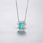 Luxury Emerald - Cut Green CZ Halo Pendant Necklace in Sterling Silver - NAFALUXE