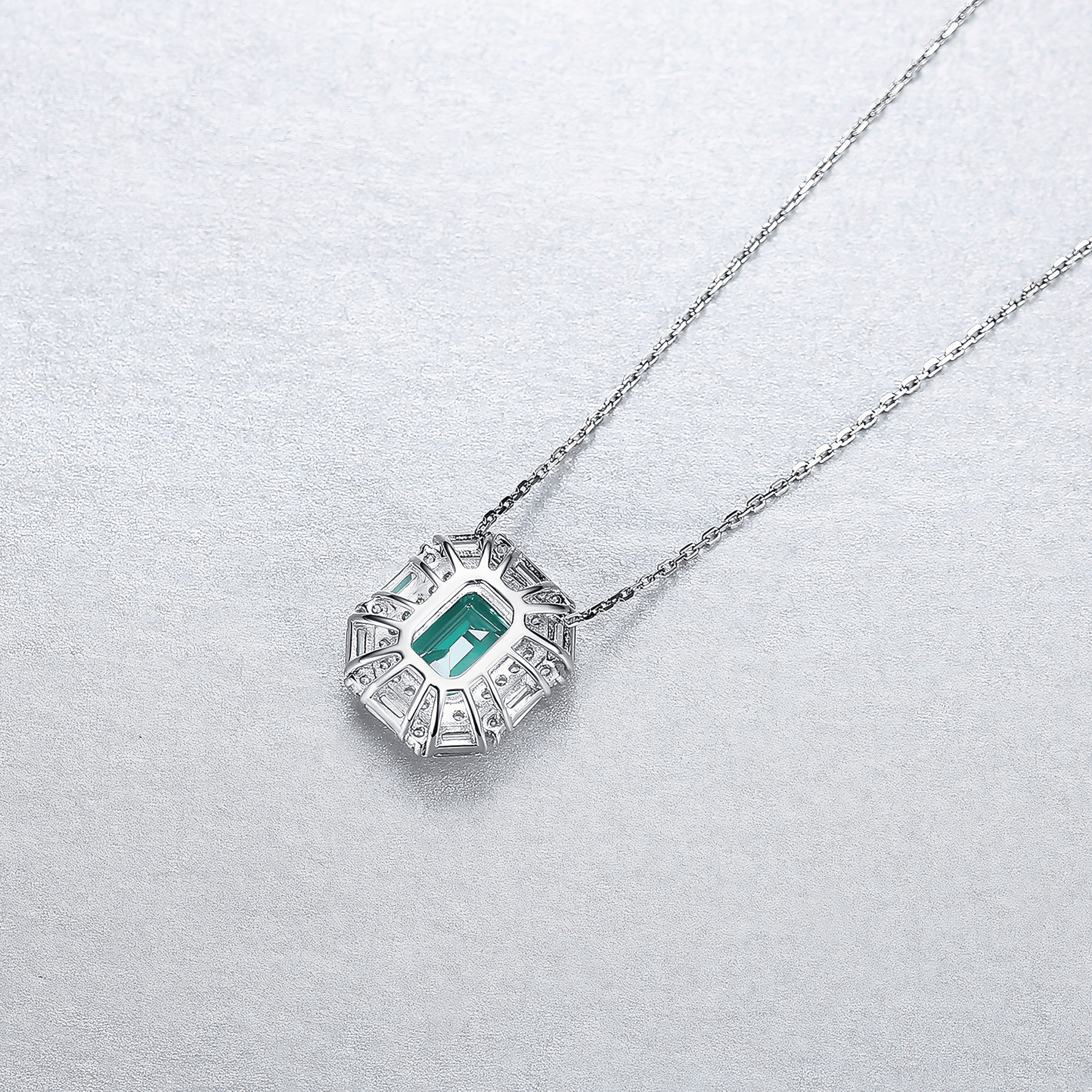 Luxury Emerald - Cut Green CZ Halo Pendant Necklace in Sterling Silver - NAFALUXE