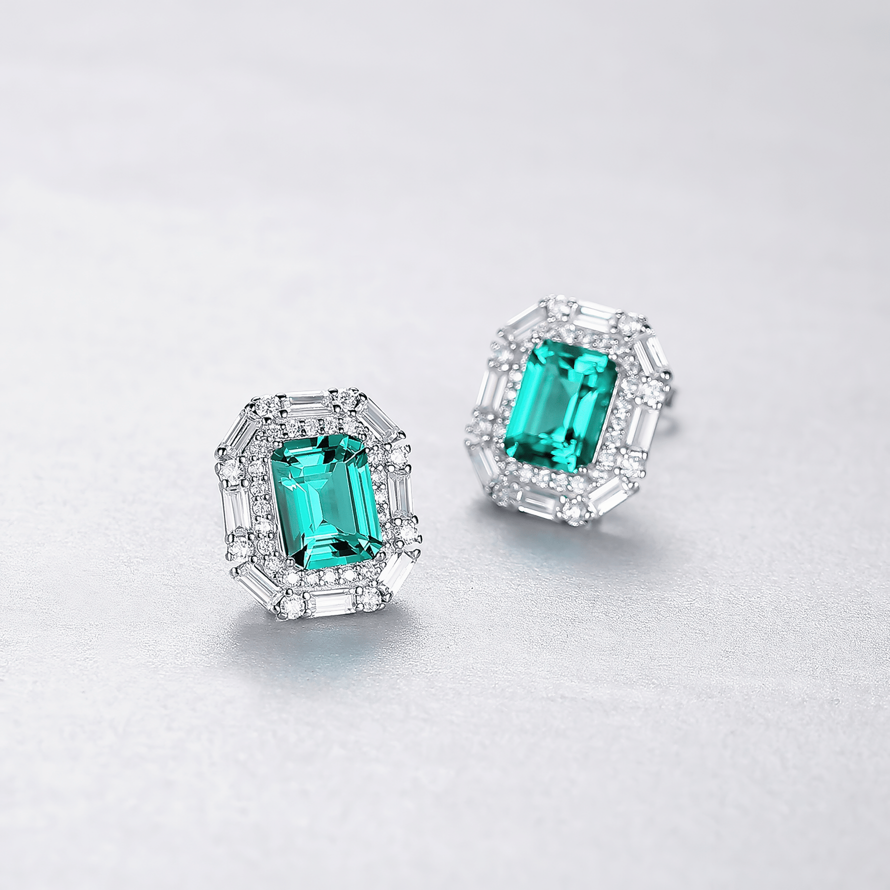 Luxury Emerald - Cut Green CZ Halo Stud Earrings in Sterling Silver - NAFALUXE
