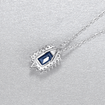 Collier pendentif de luxe en argent sterling avec saphir bleu et zircone cubique en halo - NAFALUXE