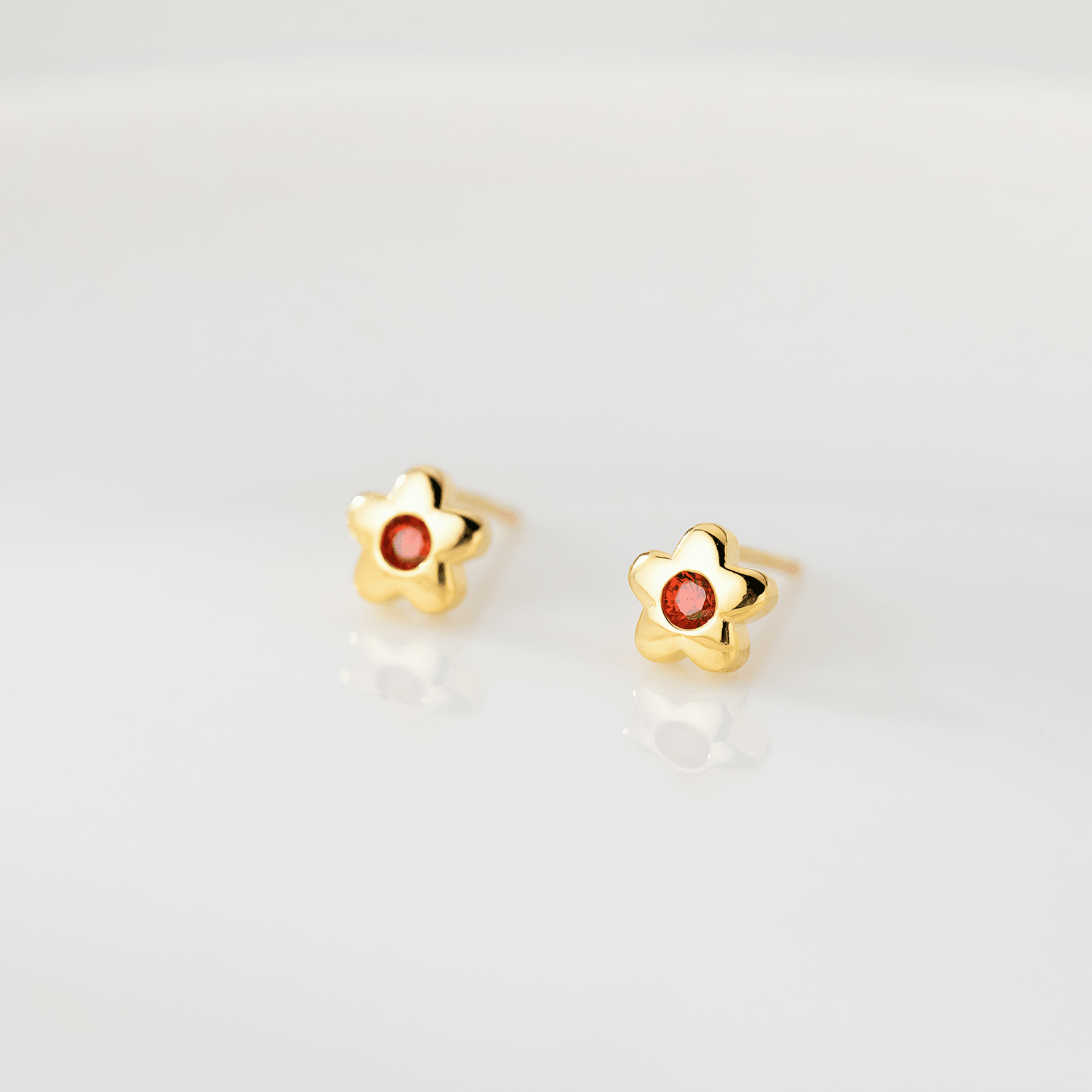 Minimalist Daisy Stud Earrings – 925 Sterling Silver Flower Earrings with Red CZ - NAFALUXE